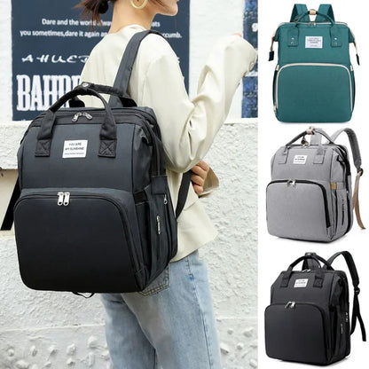 Nestie™ Portable All-in-One Baby Haven – Foldable Diaper Bag, Travel Bassinet, Napping Crib & Changing Station