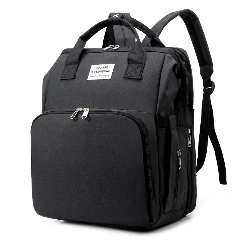 Nestie™ Portable All-in-One Baby Haven – Foldable Diaper Bag, Travel Bassinet, Napping Crib & Changing Station