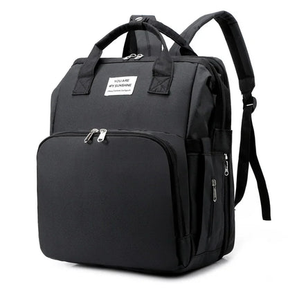 Nestie™ Portable All-in-One Baby Haven – Foldable Diaper Bag, Travel Bassinet, Napping Crib & Changing Station