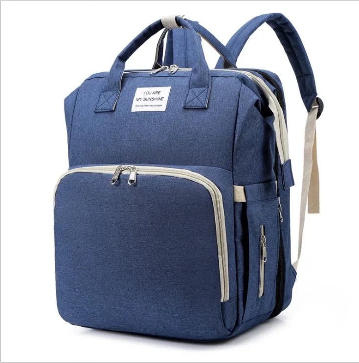 Nestie™ Portable All-in-One Baby Haven – Foldable Diaper Bag, Travel Bassinet, Napping Crib & Changing Station
